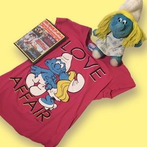Vintage smurfette stuffie with pink smurf tshirt and dvd